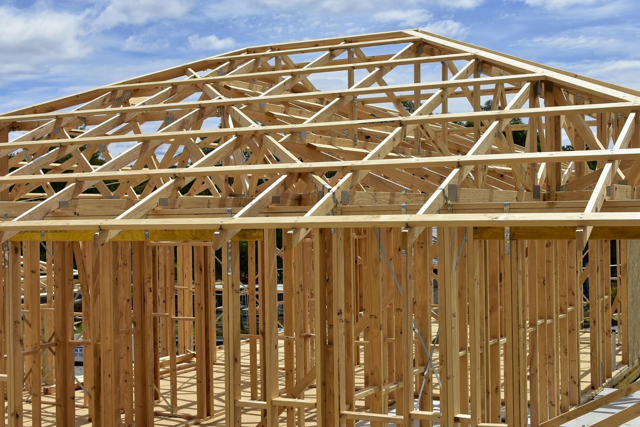 Timber framing project representing skilled construction labour coordination